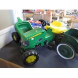 A John Deere tractor and trailer