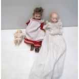 Two babydolls, one bisque together with a bisque head girl doll,