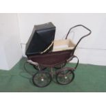 A Victorian style dolls pram