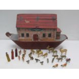 A late Victorian/ early Edwardian wooden painted Noahs Ark with a good quantity of wooden animals