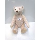 A white Steiff 1921 Replica bear,