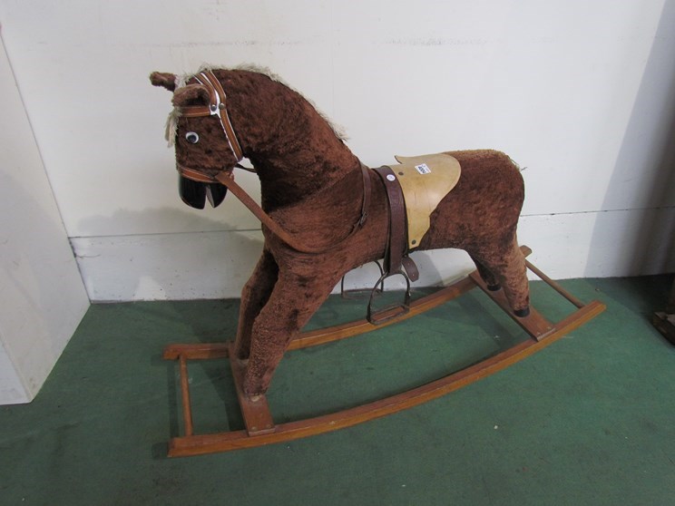 A modern rocking horse on bow rocker