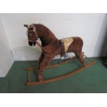 A modern rocking horse on bow rocker