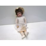 A bisque head, composition body girl doll, 52cms, head stamped 301 W&Co.