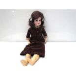 A bisque head, composition body Simon & Halbig doll, 52cms,