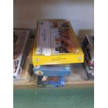 Five assorted boxed unmade model kits including "Caldercraft" H.M.