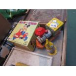 Three 1960's Japanese clockwork toys including Micky Mouse and a Melody Train