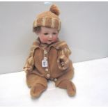 An Armand Marseille character baby doll G327B German A15M made for George Burgfeld & Co