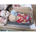 A hard plastic Pedigree doll and celluloid doll