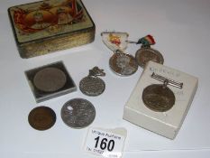 A quantity of medals including WW2 and a 1911 Coronation tin