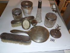A mixed lot of silver topped jars etc