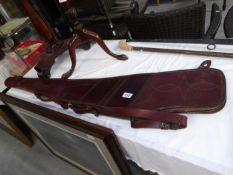 A leather 'leg of mutton' rifle case