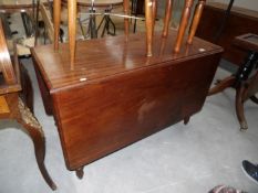 A Victorian mahogany drop leaf table