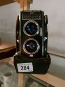 A vintage Ricoh auto 66 camera