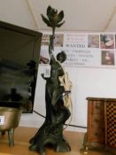 An original spelter art nouveau figurine lamp singed 'Rousseau'