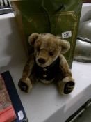 A Harrod's teddy bear with bag
