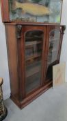 A Victorian mahogany glazed book case