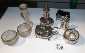 A mixed lot of silver plate condiment items