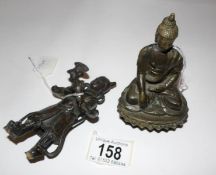 A brass Buddha and a Chinese figure