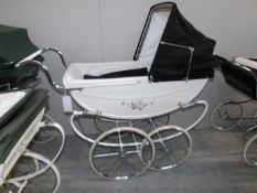 A vintage Marmet coach built babies pram,