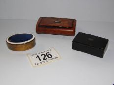 A red fruitwood snuff box,