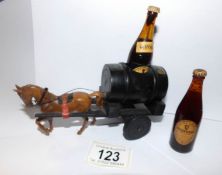 A Guinness advertising wagon and horse with 2 miniature Guinness bottles