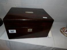 A Victorian rosewood vanity box with contents