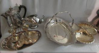 A mixed lot of silver plate including egg cup stand, basket,