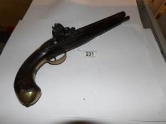 A 19th century flintlock pistol,