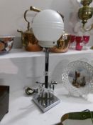 An art deco chrome table lamp