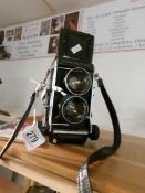 A vintage Mamiya C220 professional camera