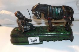 An original child's toy kicking donkey marked "Always did 'spise a mule"