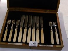 A cased set of silver fish knives and forks (missing on fork)