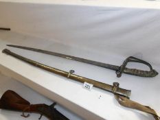 An officer's dress sword with crowned monogram, arabesque decoration,