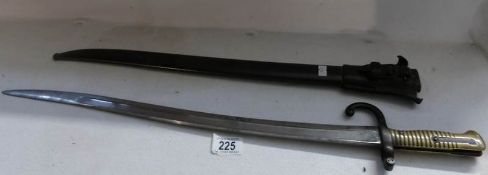 An early French bayonet complete with scabbard