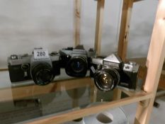 3 vintage camera's being Praktica,