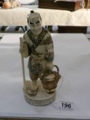 A 19th century carved ivory Chinese figure,