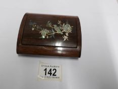 A Victorian rosewood trinket box in inlaid with mother of pearl