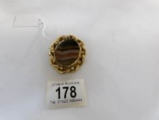 A Victorian agate mourning brooch