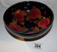 A William Moorcroft pomegranate bowl, 7" diameter, 1920's,