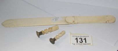 2 19th century ivory seals together with an ivory and bone page turner