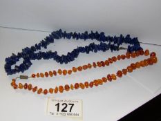 An early natural amber necklace and a malachite necklace