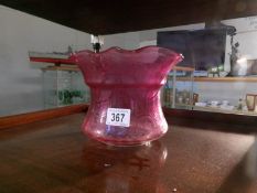 A cranberry glass acid etched oil lamp shade