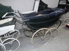 A vintage coach built babies pram, in good condition,