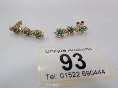 A pair of 18ct gold emerald and diamond drop earrings