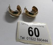 A pair of 9ct gold hoop earrings