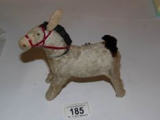A Japanese toy clockwork donkey