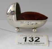 A rare 1906/07 silver pin cushion as a babies cradle