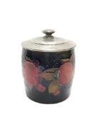 A William Moorcroft pomegranate preserve jar with Tudric pewter cover,