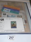 A folder of mint stamps including sets and singles, first day issues,